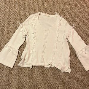 White sweater with fringe